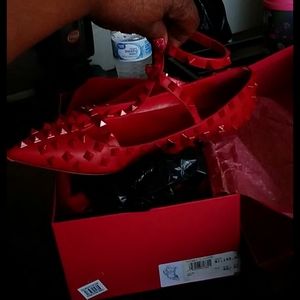 A pair of red Valentino's